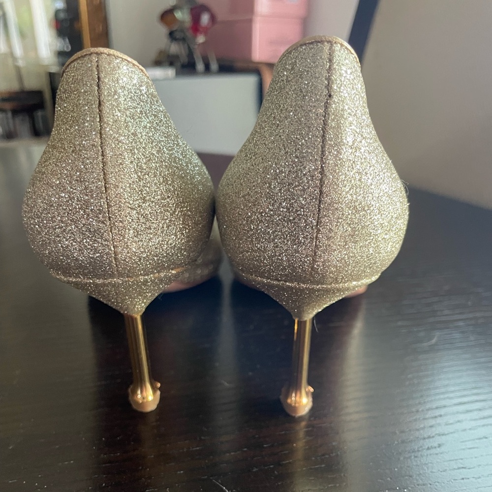 Gold Prada shoes